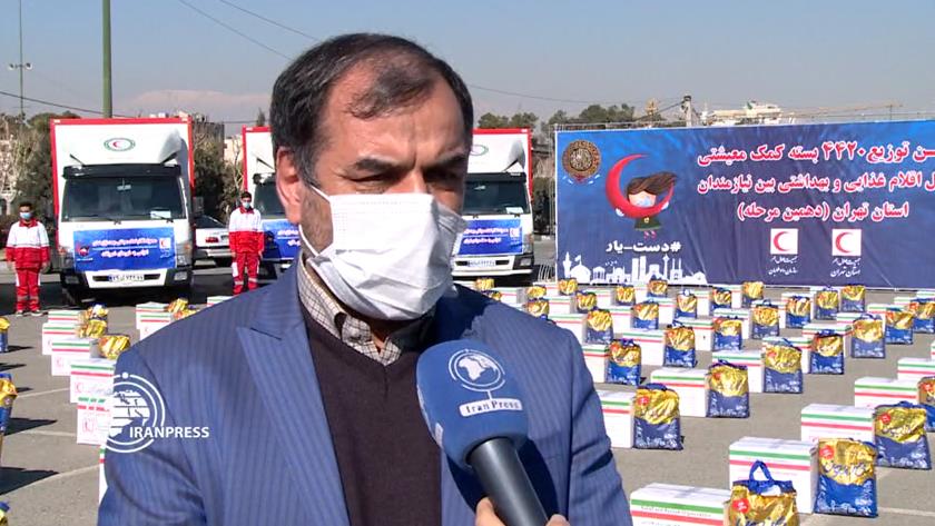 Iranpress: 370 b Tomans aids collected for coronavirus-hit people: Official