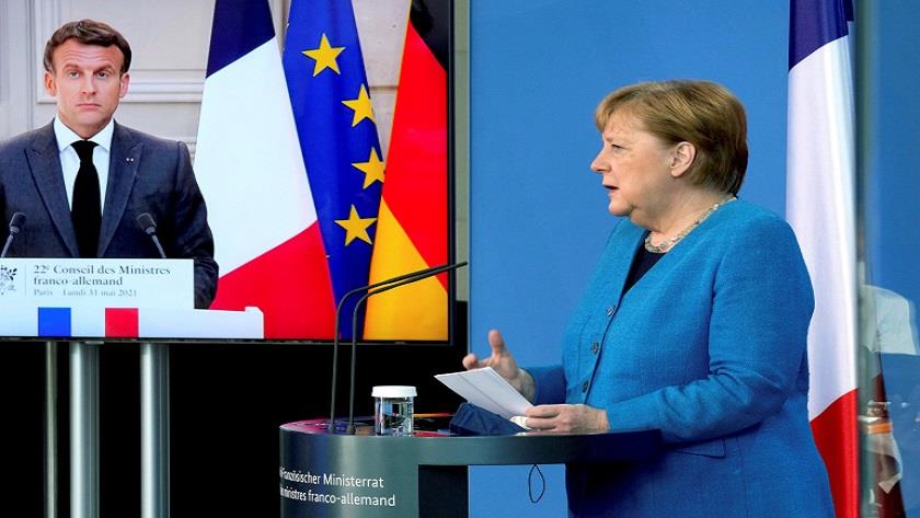 Iranpress: Macron, Merkel demand explanation over US espionage on European officials
