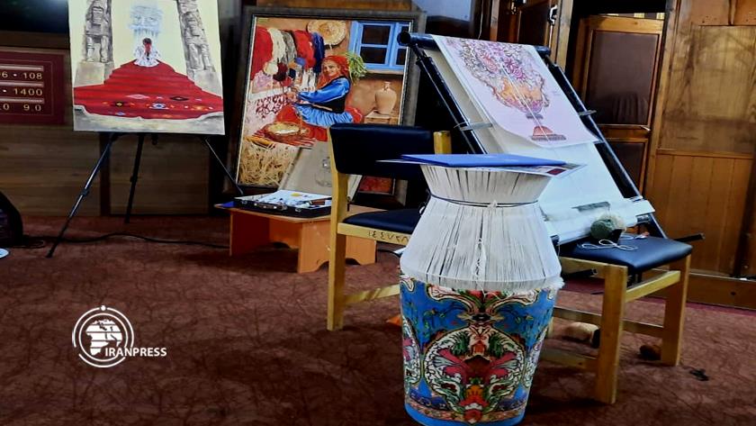 Iranpress: Iran unveils carpet books, women handicrafts