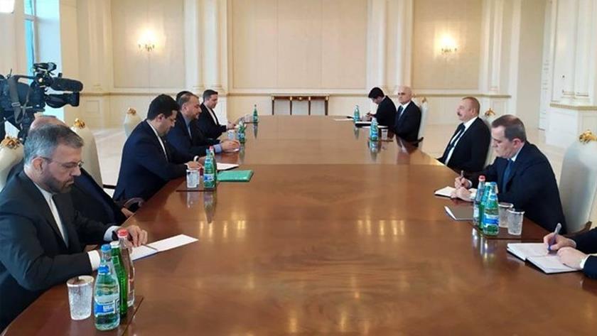 Iranpress: Iran FM, Azerbaijan Republic Pres. meet, agree to develop relations