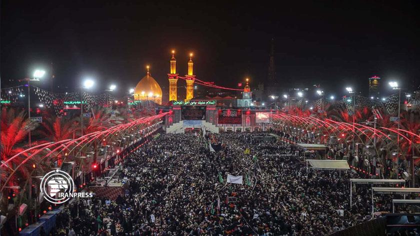 Iranpress: Millions of Muslims mourn Imam Hussein on Tasua in Karbala