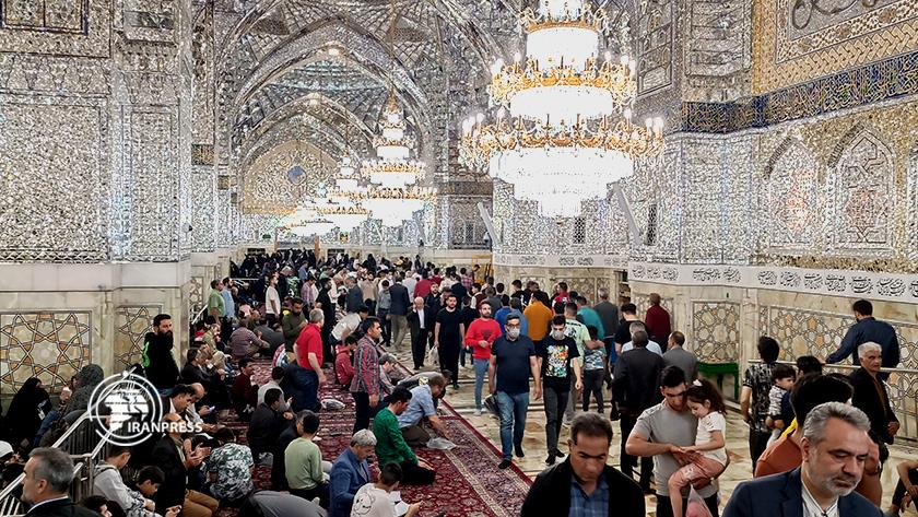Iranpress: Watch Iranians celebrate Nowruz at Imam Reza shrine
