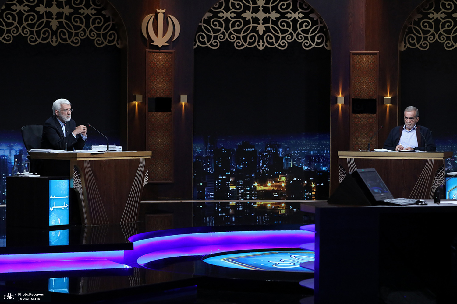 Iranpress: نگاهی به نخستین مناظره دور دوم نامزدها در آستانه انتخابات