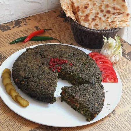 Iranpress: کوکو سبزی؛ غذای سنتی ایرانی نماد فرهنگ غذایی ایران