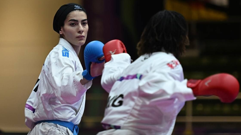 Iranpress: گلشادنژاد هم طلایی شد؛ نتایج تاریخی بانوان کاراته ایران در ریاض