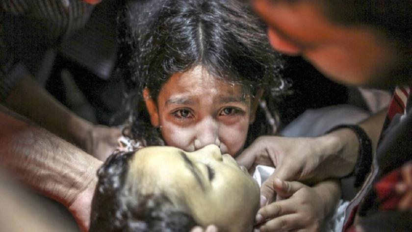 Iranpress: شهادت 10 هزار و 150 کودک و زن در غزه