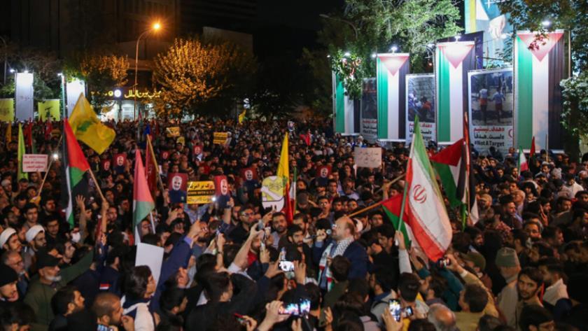 Iranpress: تجمع مردمی در میدان فلسطین تهران برای اقدام فوری علیه رژیم صهیونیستی