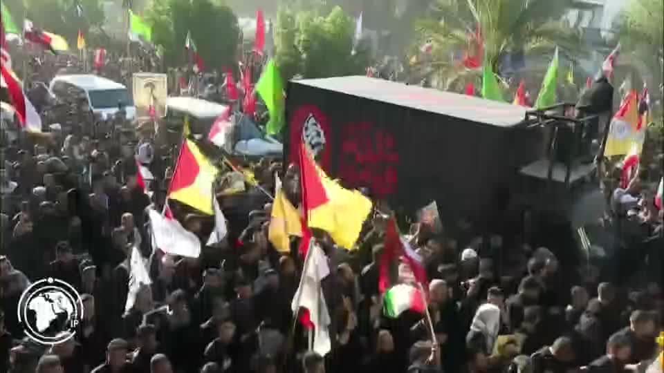 Iranpress: الحشد الشعبي: قرابة 2/5 مليون عراقي يشاركون في تشييع القائد الشهيد بالنجف