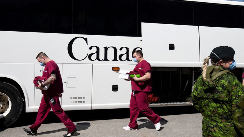 A bus carrying Canadian Armed Forces (CAF) medical personnel arrives at Villa Val des Arbres, a seniors