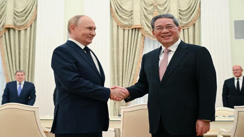 China, Russia Confer on Western pressure, Stronger Cooperation