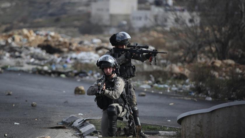 Iranpress: Zionist driver kills 2 Palestinian workers at military checkpoint