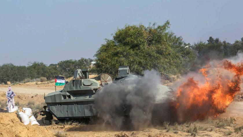 Iranpress: Palestinians hold joint military drill in Gaza Strip 