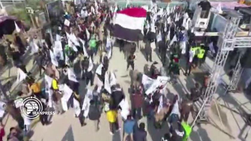 Iranpress: Iraqis attend al-Muhandis tomb in martyrdom anniv