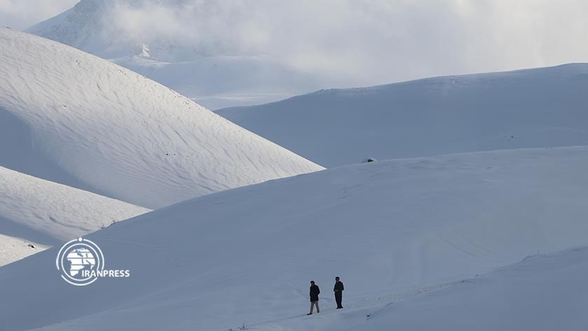Iranpress: Snowfall doubled beauty of Kulah-behi tourist village