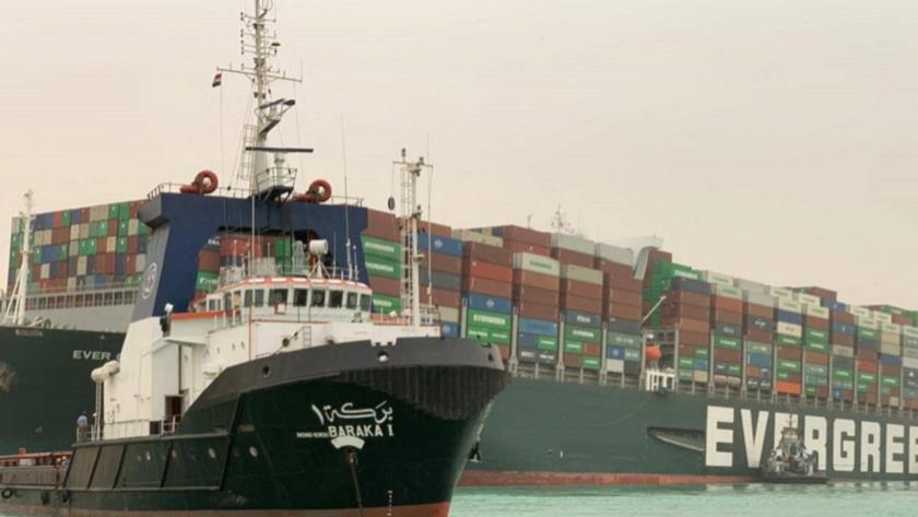 Iranpress: Egypt loses $400m per hour due to wedged cargo ship in Suez Canal
