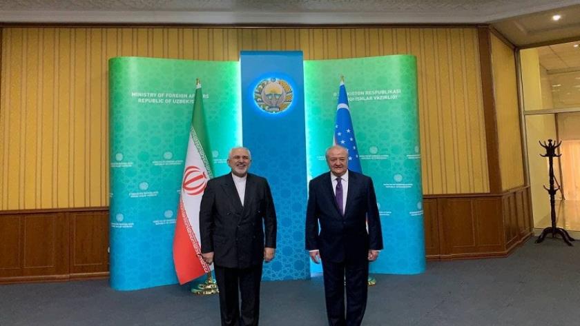 Iranpress: Iran, Uzbekistan FMs meet in Tashkent
