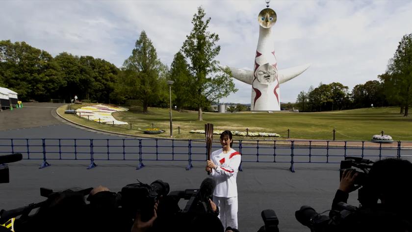 Iranpress: Olympic torch relay goes through empty Osaka park as COVID-19 cases rise