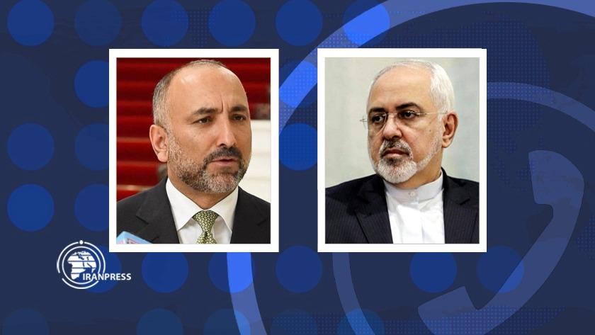 Iranpress: Iranian, Afghan FMs hold phone talk