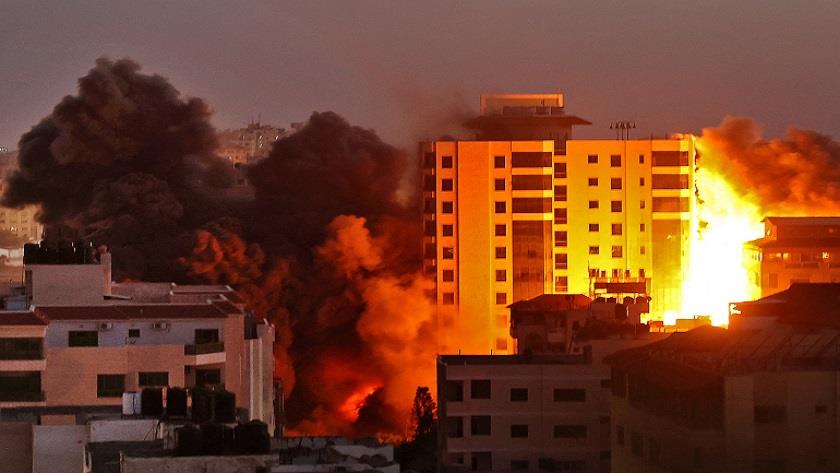 Iranpress: Israeli military destroys Media building  in Gaza