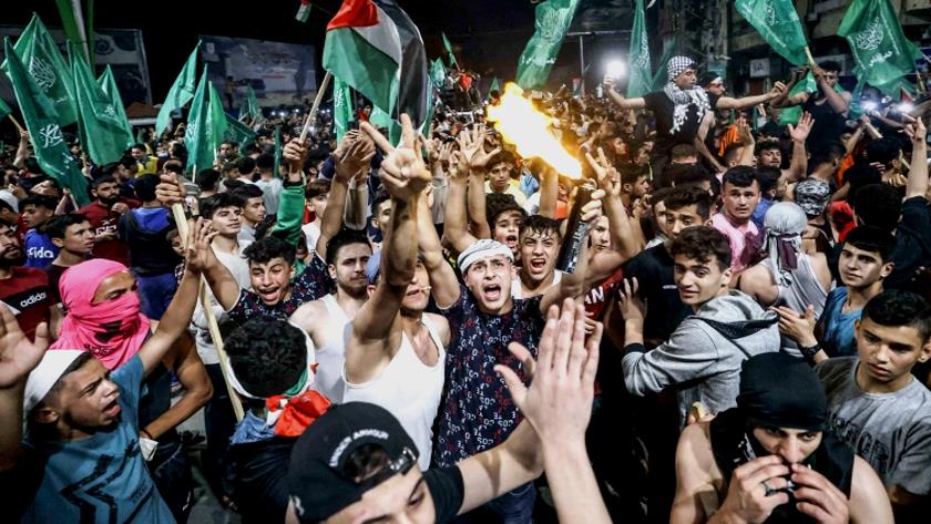 Iranpress: Palestinians celebrate victory as Israel agrees to ceasefire 