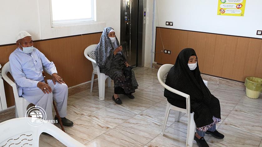 Iranpress: Non-Iranian nationals are being vaccinated in NE Iran