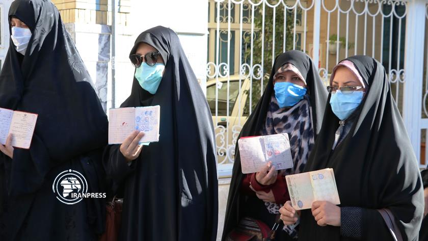 Iranpress: People, pilgrims vote in Mashhad to elect president