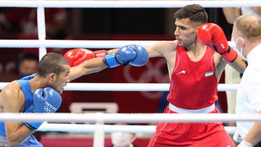 Iranpress: Iranian boxer winner in his first contest in Tokyo Olympics
