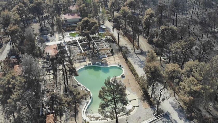 Iranpress: Drone shows extensive wildfire damage on Evia, Greece