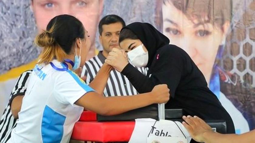 Iranpress: Iranian girl wins silver medal in Asian Arm-wrestling C