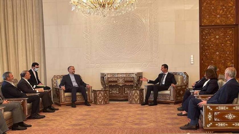 Iranpress: Iranian FM, Syrian President meet