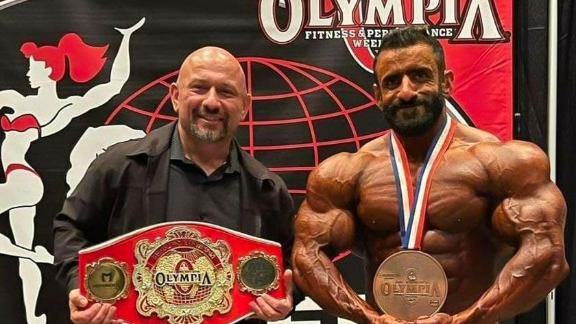 Iranpress: Iranian bodybuilder snatches bronze medal at Mr. Olympia 2021