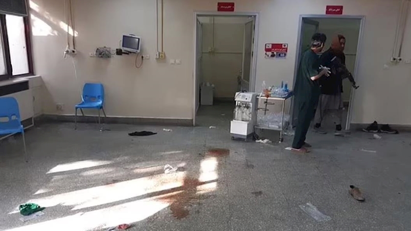 Iranpress: More than 75 killed, injured in ISIS attack to Afghan biggest military hospital