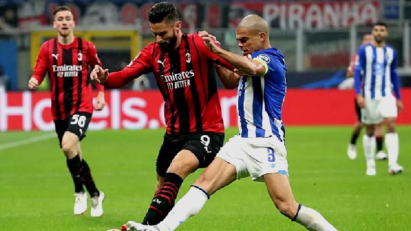 Iranpress: Milan draws 1-1 against Porto to keep faint CL hopes alive