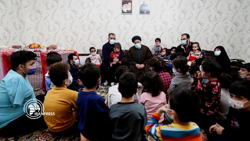 Iranpress: Pres. Raisi appears in gathering of orphans, disabled children on Yalda Night