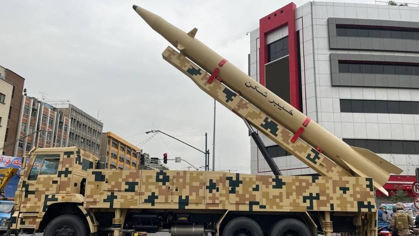 Iranpress: Iran unveils new ballistic missiles amid Quds Day rallies