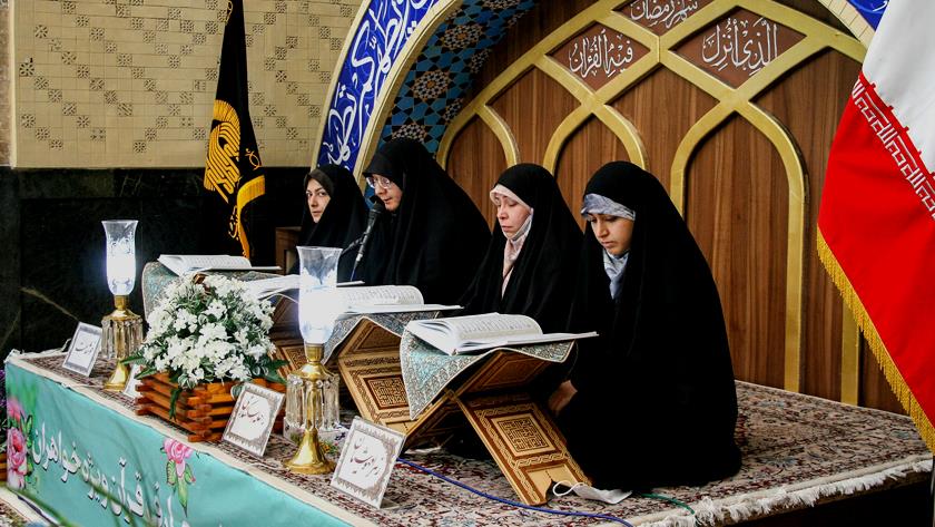 Iranpress: Women recite Quran at Imam Reza holy shrine