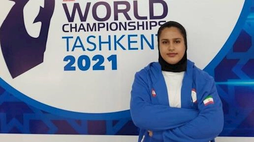 Iranpress: Woman weightlifter snatches 1st medal for Iran