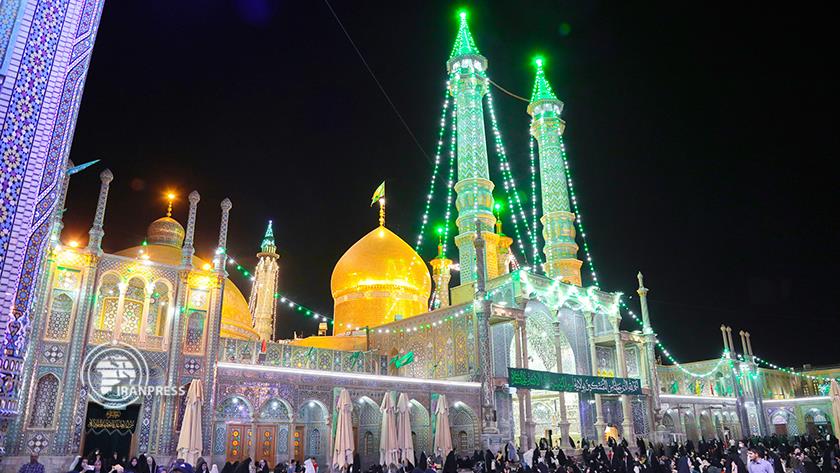 Iranpress: Eid Al-Ghadir; Fatimah al-Masumah shrine decorated with lightning in Qom