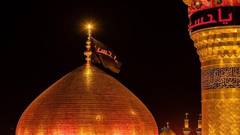 Iranpress: Black flag hoisted over dome of Imam Hussein