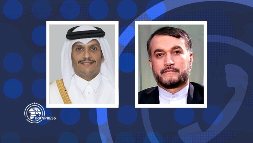 Iranpress: Iran, Qatar FMs confer on bilateral ties via phone call