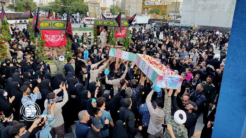 Iranpress: Iranians bid farewell to Shrine-Defender martyrs