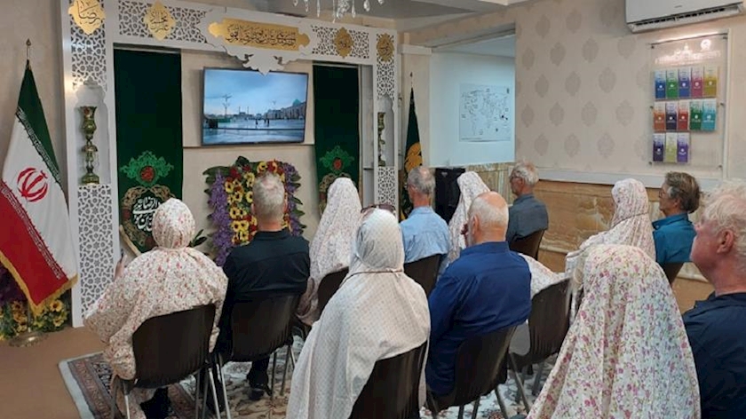 Iranpress: Tourists from the Netherlands, Germany visit Imam Reza