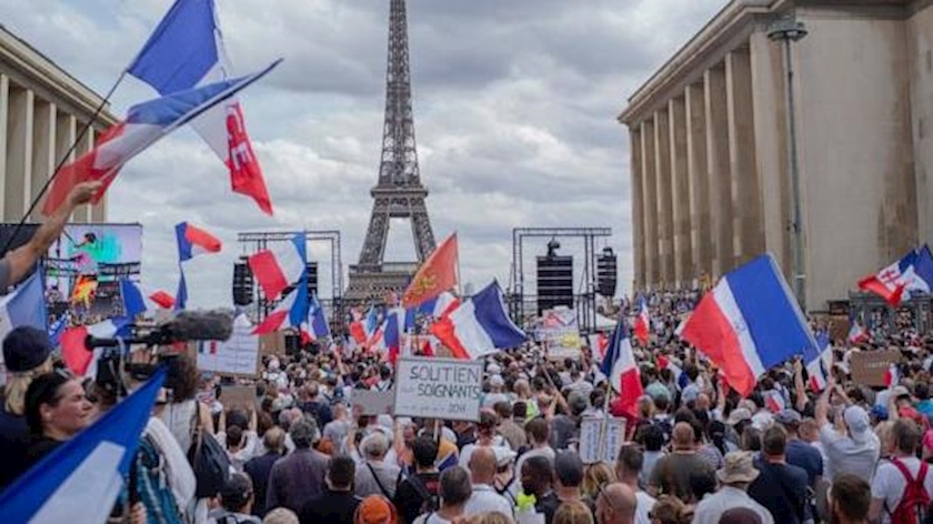 Iranpress: Thousands rally in Paris demanding Macron