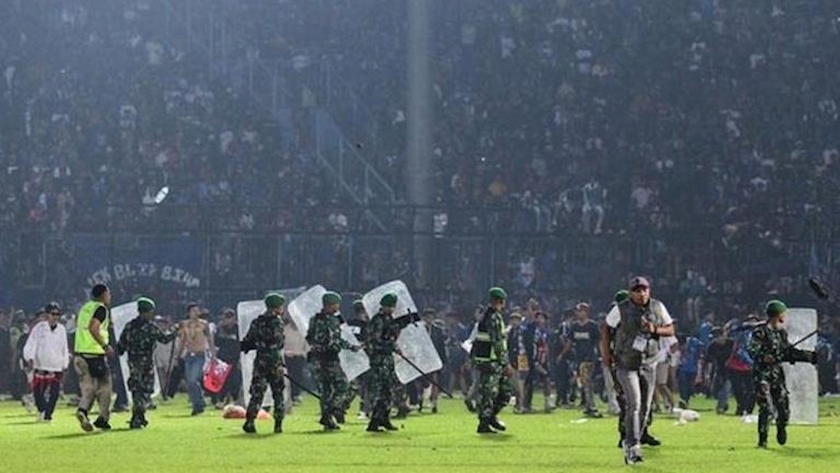 Iranpress: FIFA called Indonesia stadium crush a 
