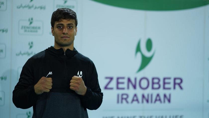 Iranpress: Iranian boxer qualifies for semi-finals in Asian championship