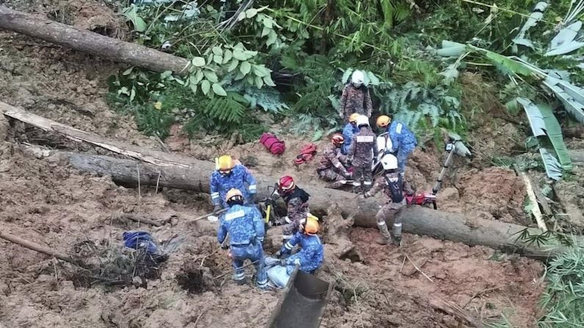 Iranpress: Death toll rises to 13 following Malaysian landslide