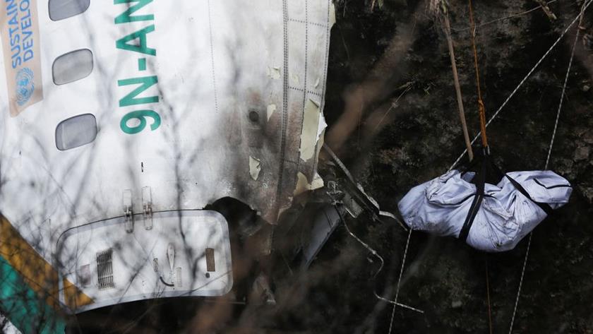 Iranpress: Searchers find black boxes of aircraft in deadly Nepal crash