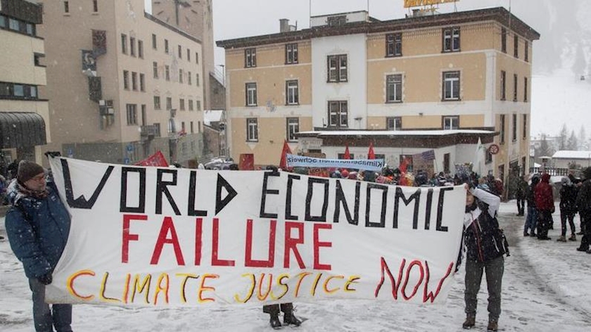 Iranpress: Climate activists in Davos protest over big oil hijacking debate