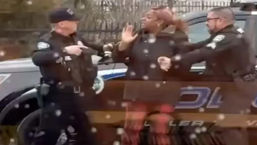 Iranpress: US police officer repeatedly punches Black woman in face over slice of cheese