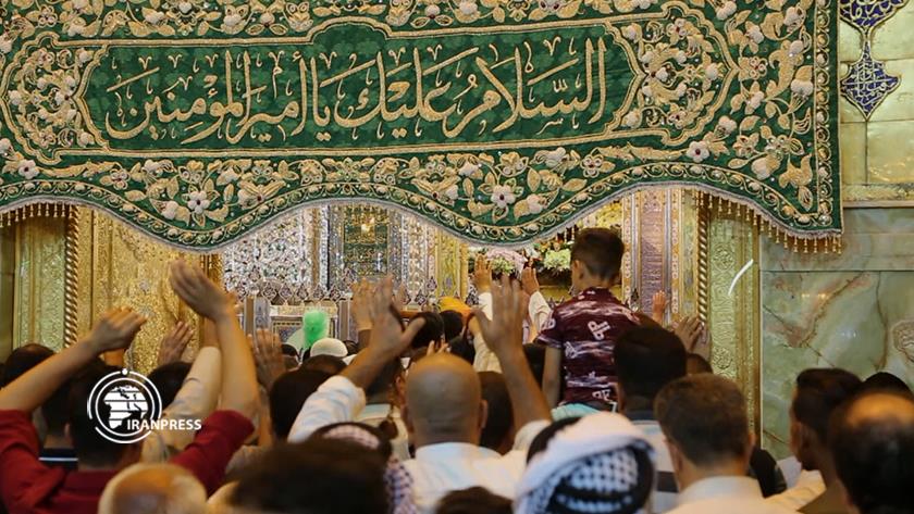 Iranpress: Najaf holy Shrine hosts pilgrims at the night of Father Day